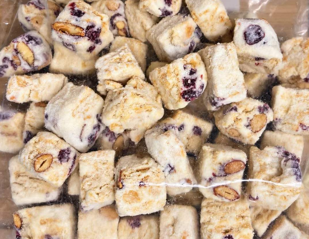 Homemade snowflake crisps with nuts and dried berries